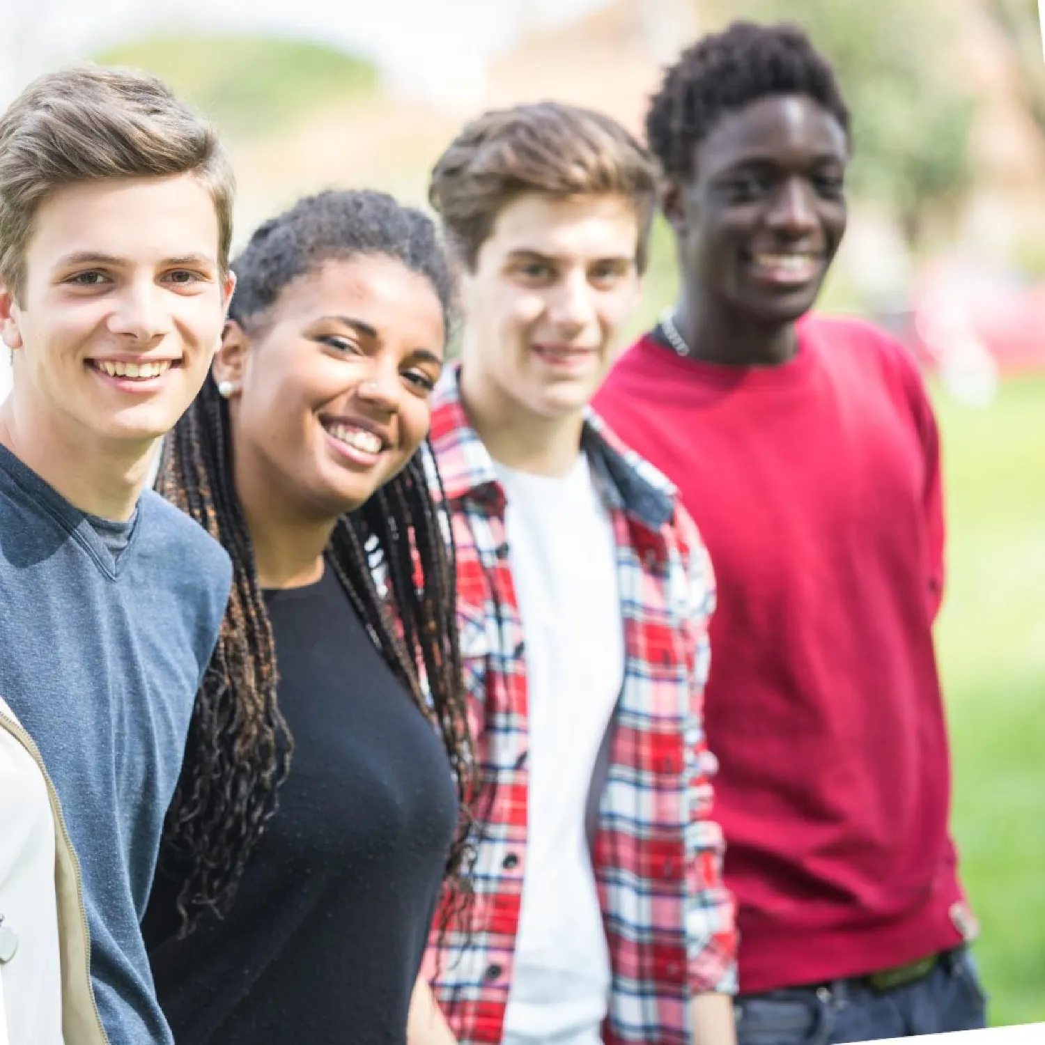 photo of 4 young people in an outdoor setting